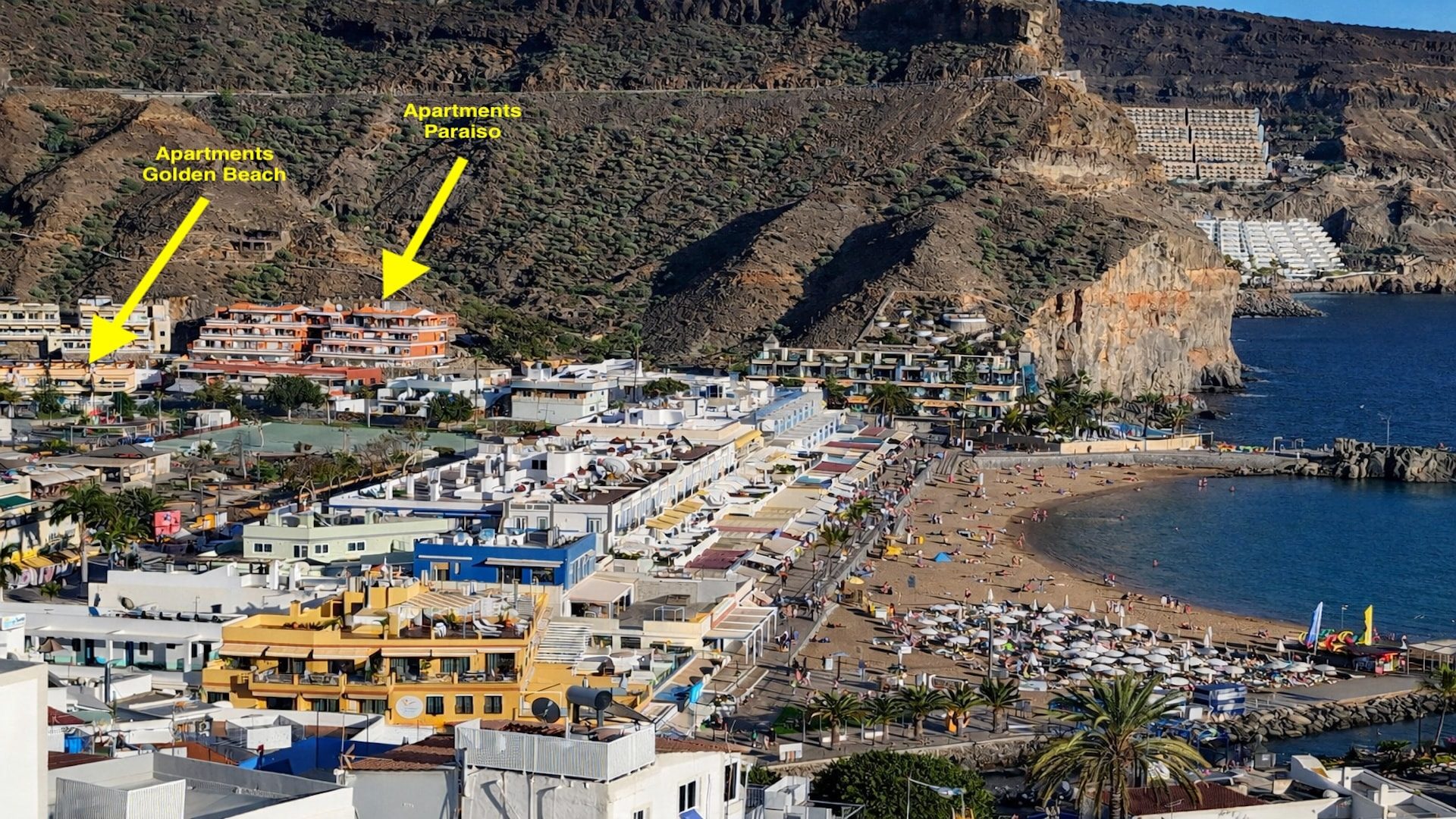 Golden Beach and Paraiso Apartments located beside Puerto de Mogán beach with sea and marina views